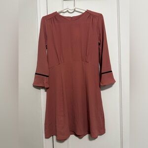 Elegant Rust Dress with Black Trim